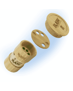 RAW Bamboo Six Shooter 1 1/4 cone filler on a wooden background.