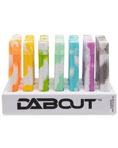 Dab Out All-in-one Kit glowing in the dark, showcasing quartz nectar collector, resin dugout, and dab tool.
